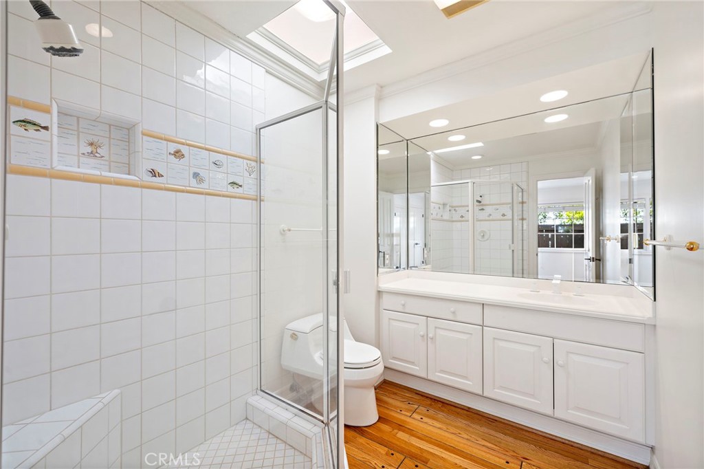 508 Seaview Street Laguna Beach, CA 92651 - Photo 11 of 28 a bathroom with a shower a sink a toilet and shower