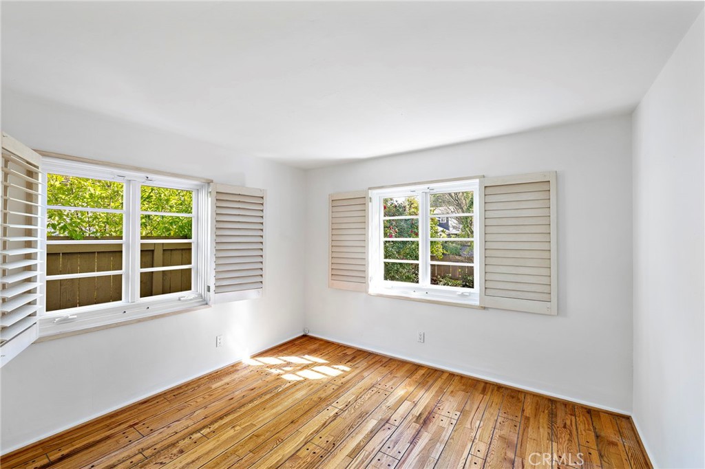 508 Seaview Street Laguna Beach, CA 92651 - Photo 13 of 28 a view of empty room with wooden floor and fan