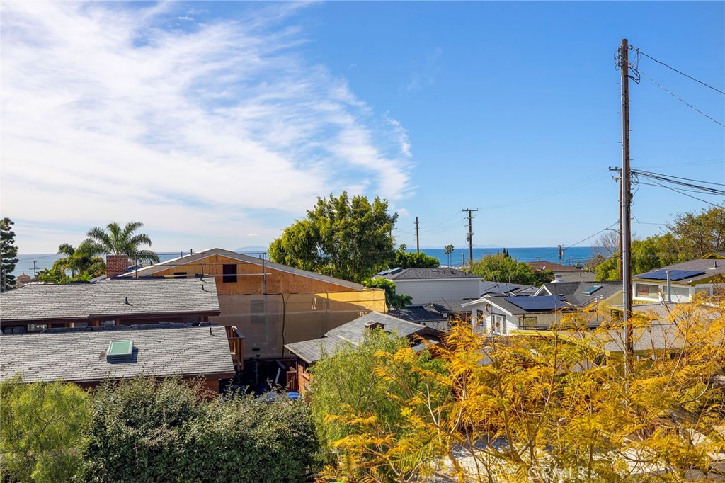 508 Seaview Street Laguna Beach, CA 92651 - Photo 18 of 28 a view of a patio with table and chairs under an umbrella