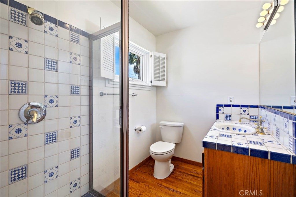 508 Seaview Street Laguna Beach, CA 92651 - Photo 19 of 28 a bathroom with a sink toilet and shower