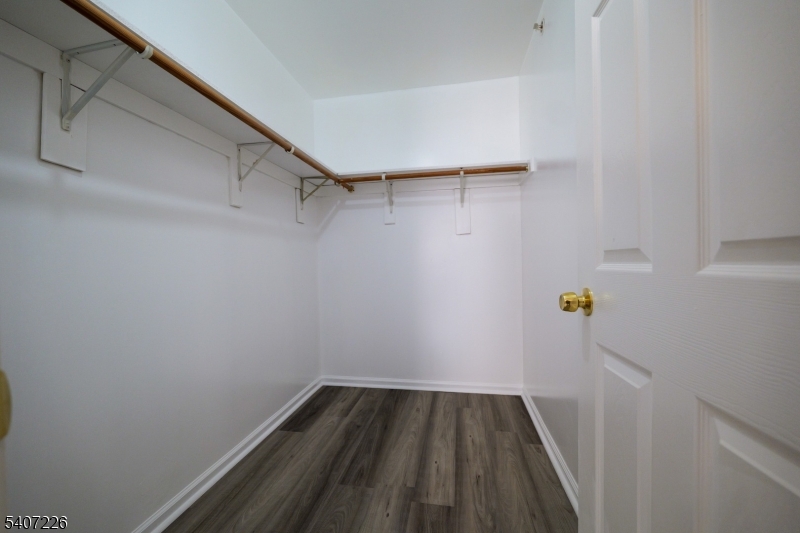 40 11th Avenue West, Unit 2 Newark, NJ 07107 - Photo 8 of 15 a view of storage and utility room with racks on the wall