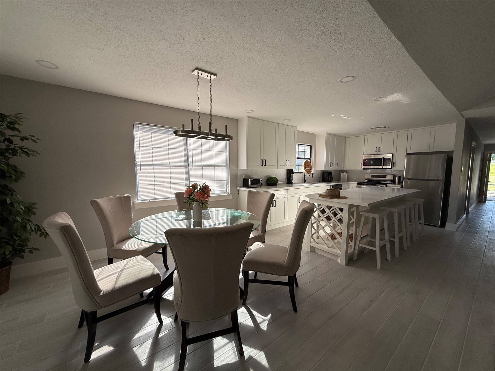 175 Heather Lane Livingston, TX 77351 - Photo 11 of 12 a view of a dining room with furniture and wooden floor