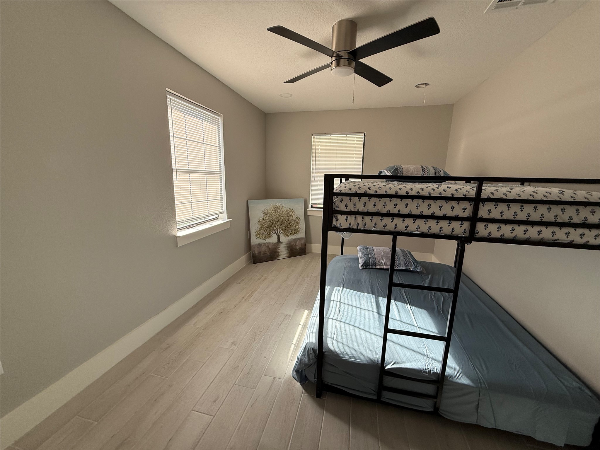 175 Heather Lane Livingston, TX 77351 - Photo 12 of 12 a bedroom with furniture and a window