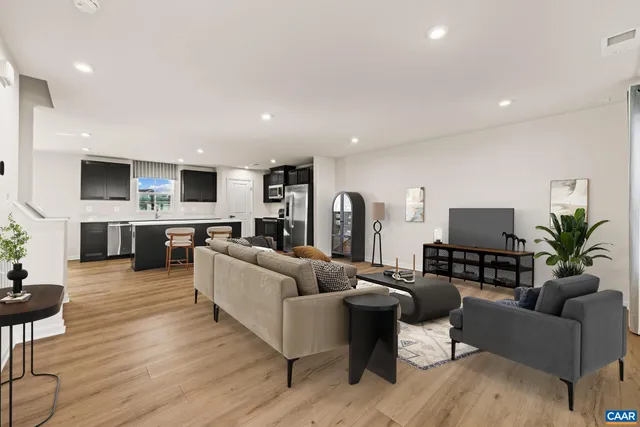 a view of a living room with a flat screen tv