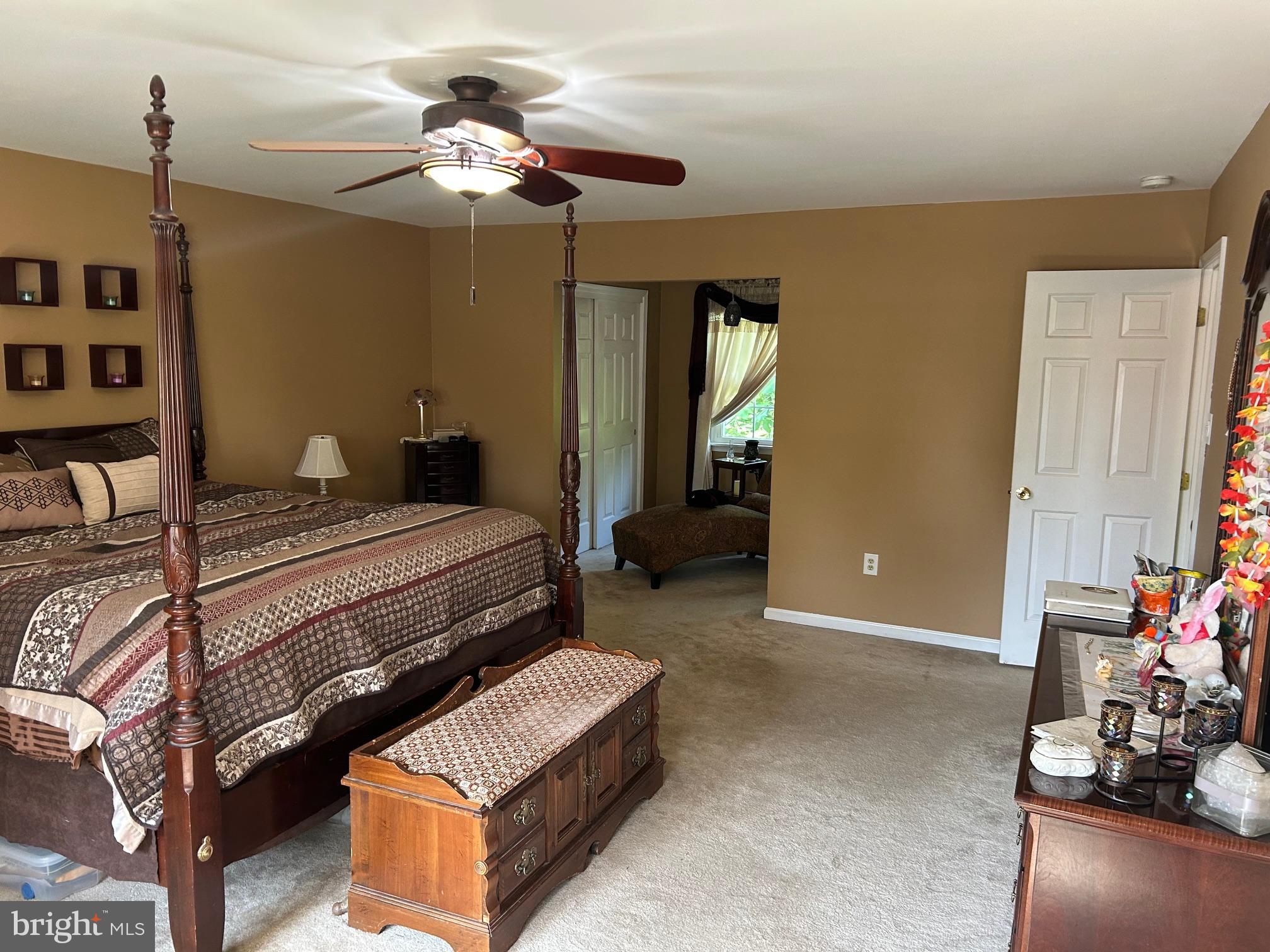 1008 Lincoln Avenue Springfield, PA 19064 - Photo 37 of 53 a bedroom with a bed and a chandelier
