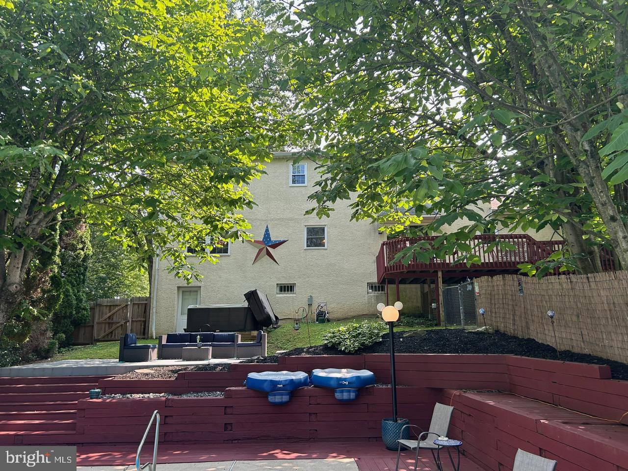 1008 Lincoln Avenue Springfield, PA 19064 - Photo 4 of 53 a view of backyard with deck and outdoor seating