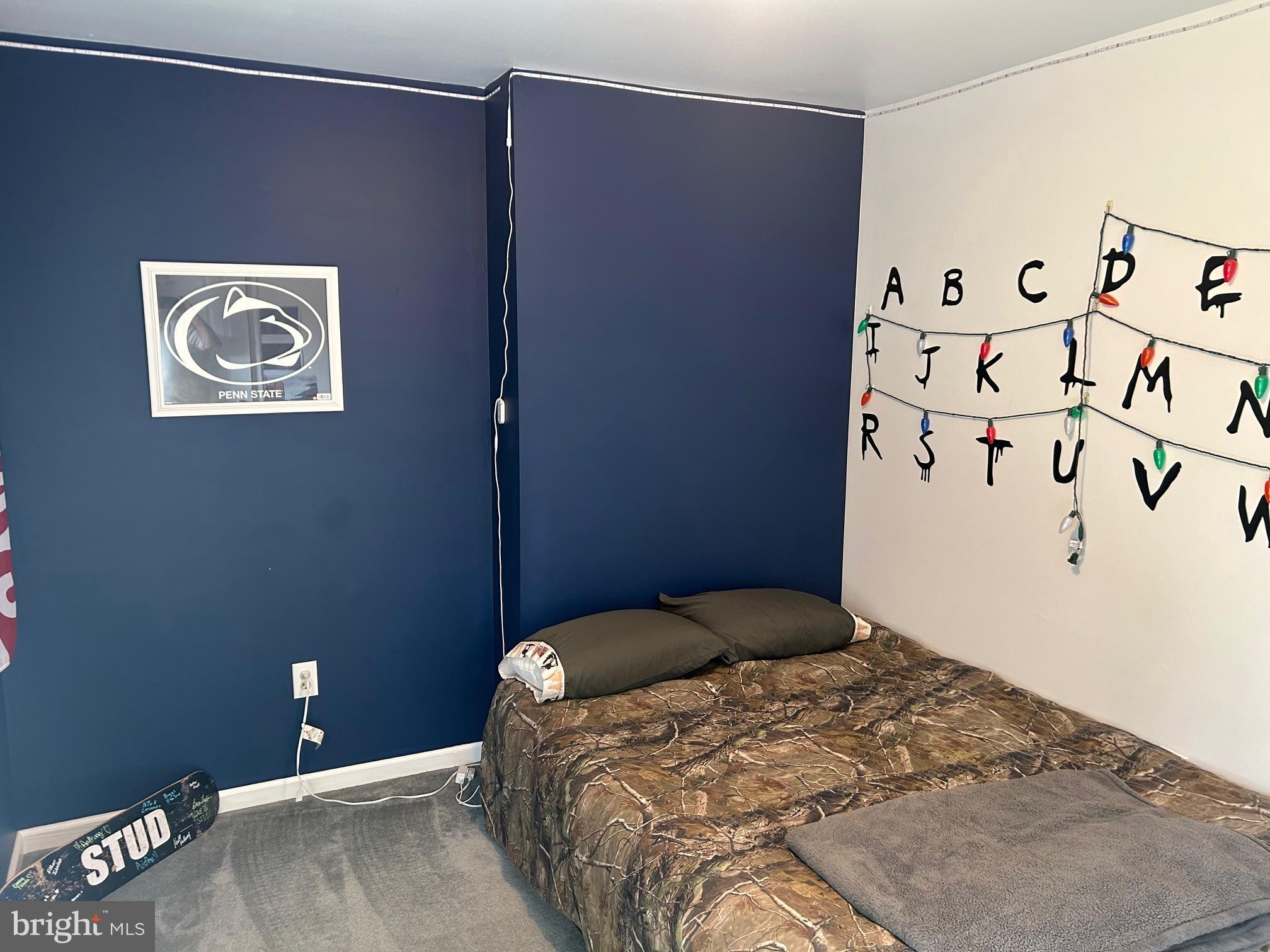 1008 Lincoln Avenue Springfield, PA 19064 - Photo 46 of 53 a bedroom with a bed and a wall painting