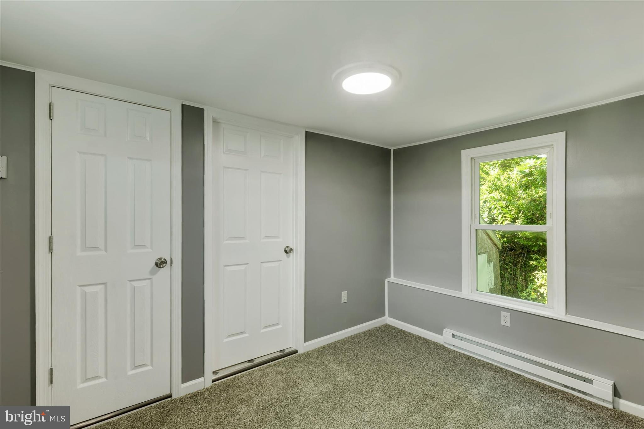 2 Windsor Acres Windsor, PA 17366 - Photo 8 of 18 an empty room with windows and closet