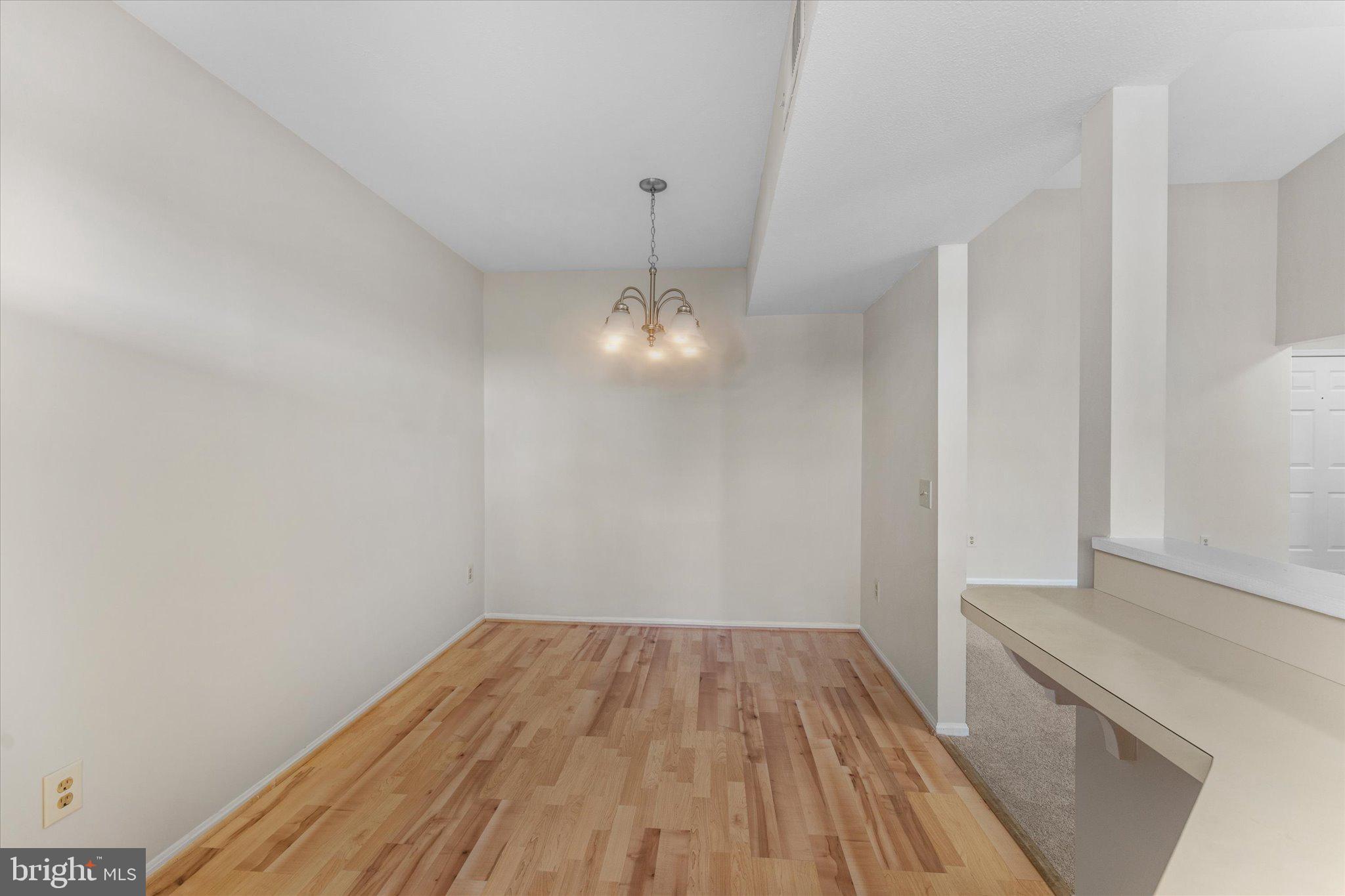 101 Fort Evans Road Southeast, Unit F Leesburg, VA 20175 - Photo 13 of 18 Eat-in kitchen with updated flooring