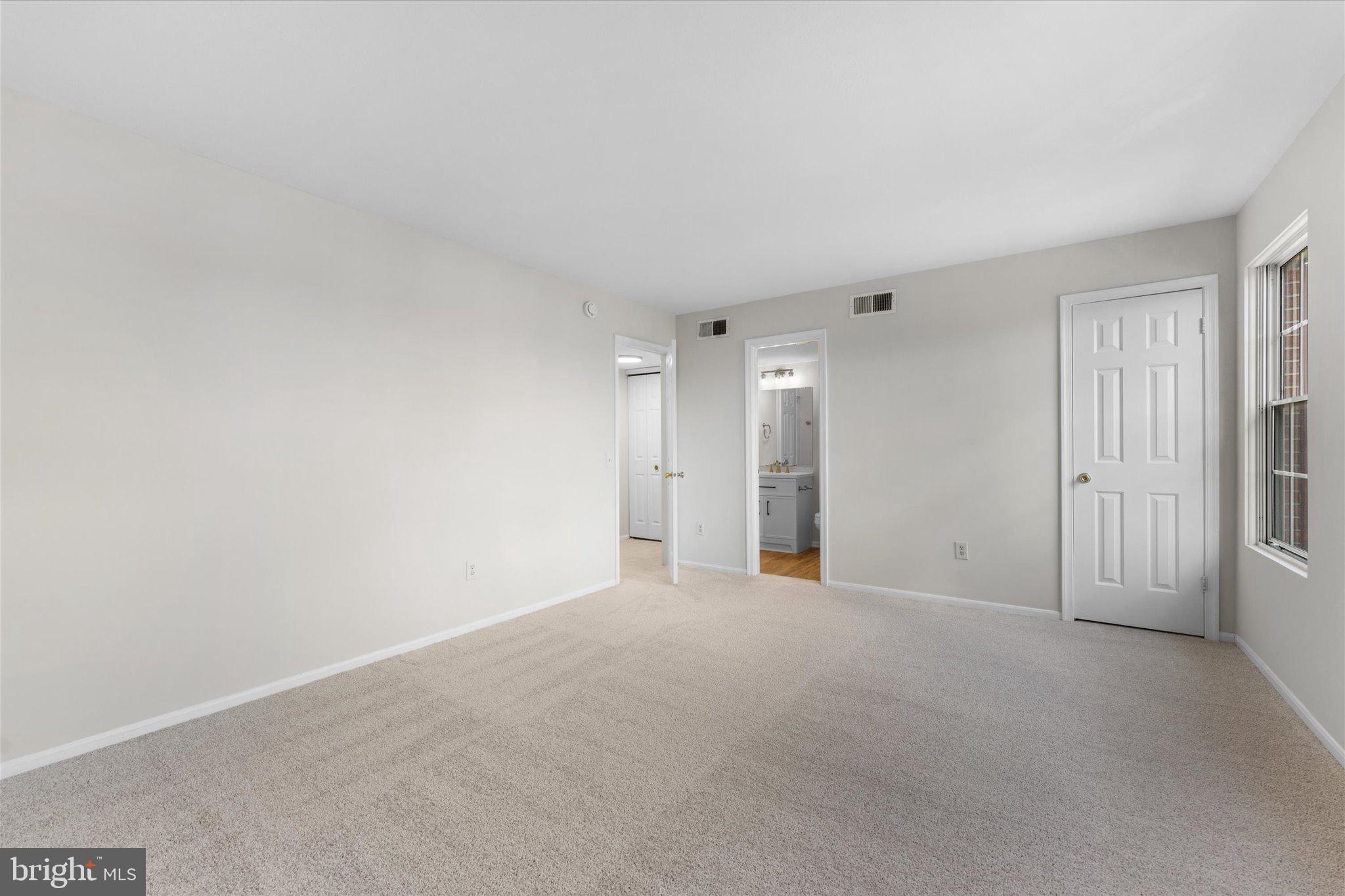 101 Fort Evans Road Southeast, Unit F Leesburg, VA 20175 - Photo 14 of 18 Primary bedroom