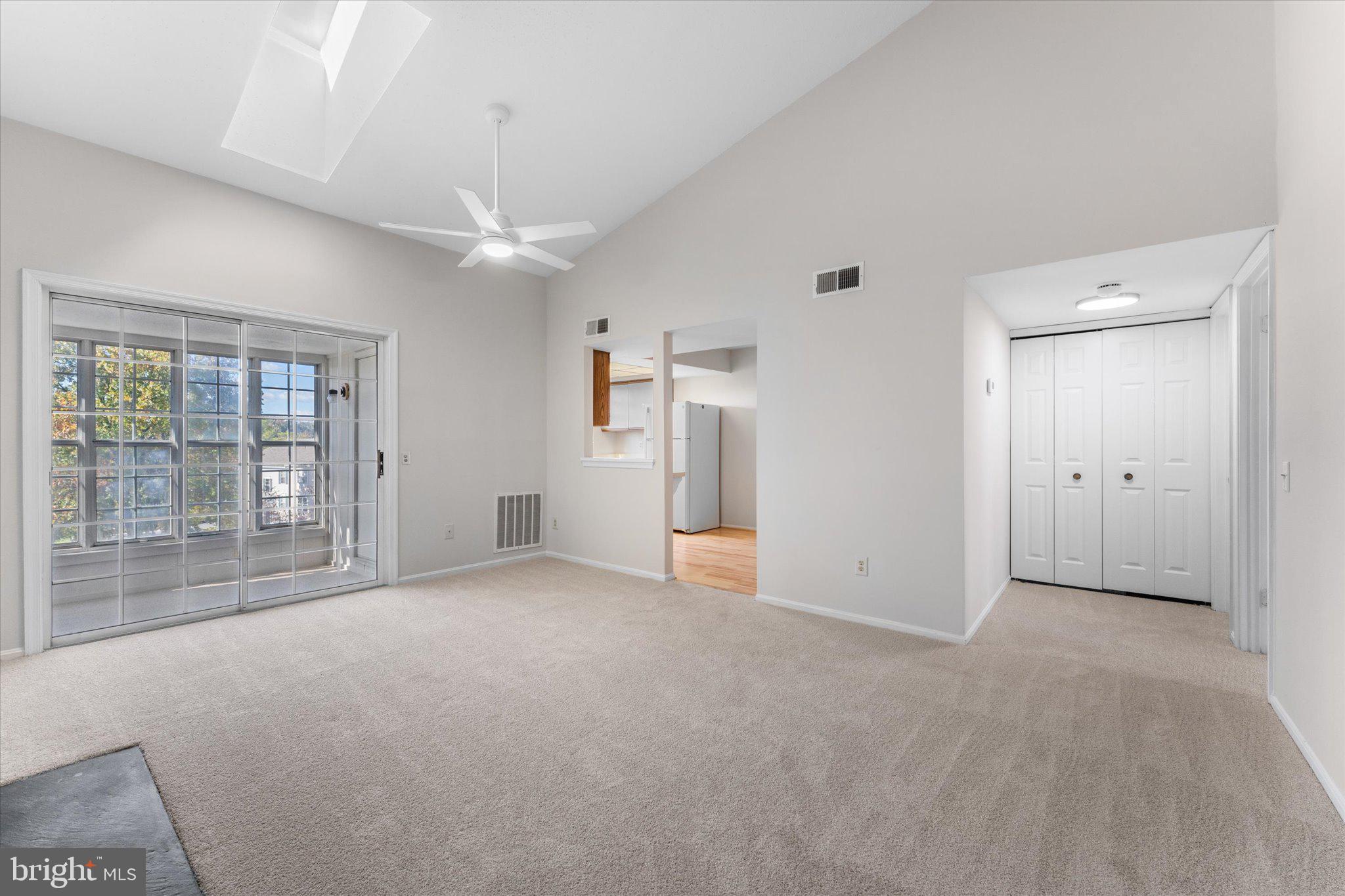 101 Fort Evans Road Southeast, Unit F Leesburg, VA 20175 - Photo 4 of 18 Family room with new carpet
