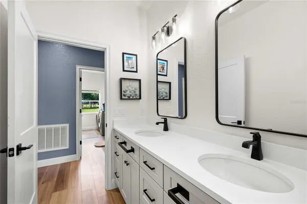 a kitchen with a stove and a microwave