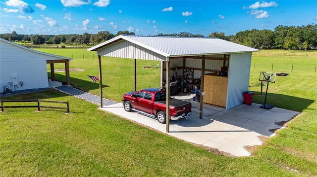 a view of a lake with a yard
