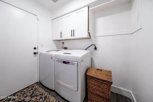a bathroom with a sink toilet and mirror