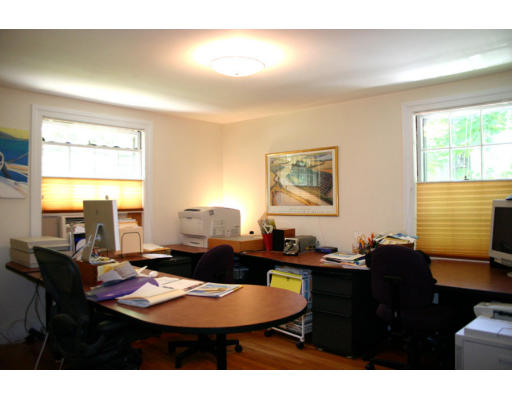 131 Concord Road Wayland, MA 01778 - Photo 11 of 14 a living room with furniture a large window and a dining table