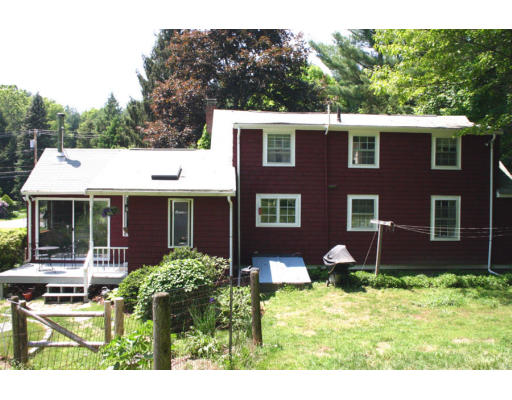 131 Concord Road Wayland, MA 01778 - Photo 13 of 14 a view of a house with a yard and sitting area