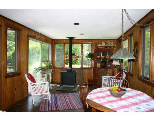 131 Concord Road Wayland, MA 01778 - Photo 6 of 14 a view of a dining room with furniture window and wooden floor