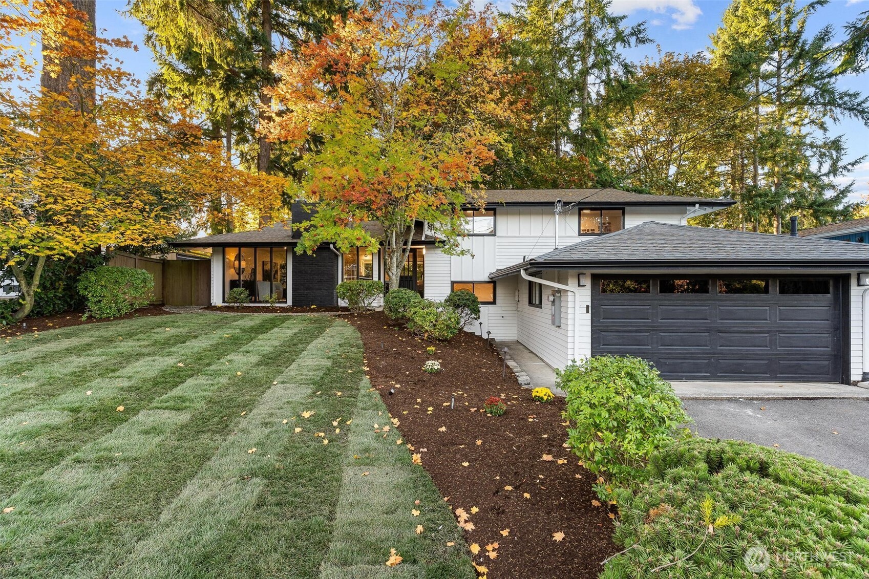 front view of a house with a yard
