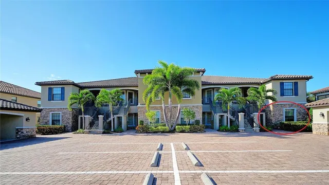 a front view of a building with street view