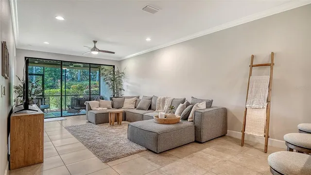 a bathroom with a granite countertop sink a mirror and a shower