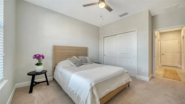 a view of a kitchen with stainless steel appliances granite countertop a sink and dishwasher cabinets