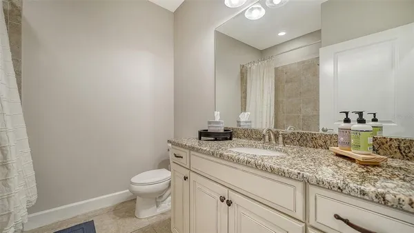 a group of people sitting at tables in a room