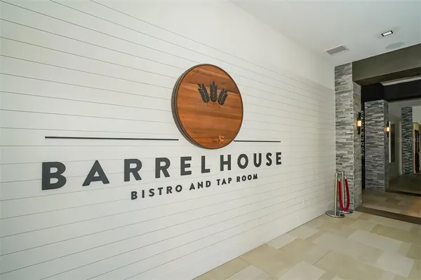 an aerial view of a house with a swimming pool yard and outdoor seating