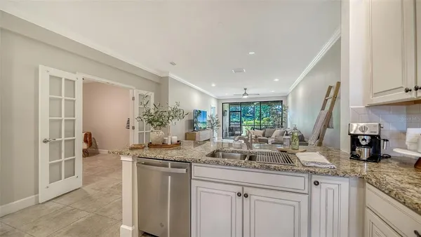 a view of a kitchen with a sink