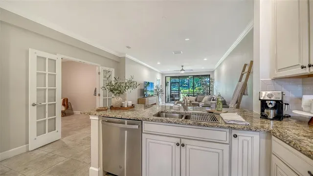 a view of a kitchen with a sink