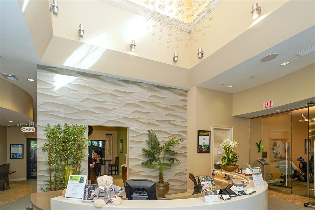 13604 Messina Loop, Unit 103 Bradenton, FL 34211 - Photo 49 of 97 a living room with furniture and a potted plant