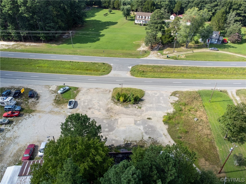 18619 Hull Street Road Moseley, VA 23120 - Photo 18 of 23 a view of a swimming pool with a yard and plants