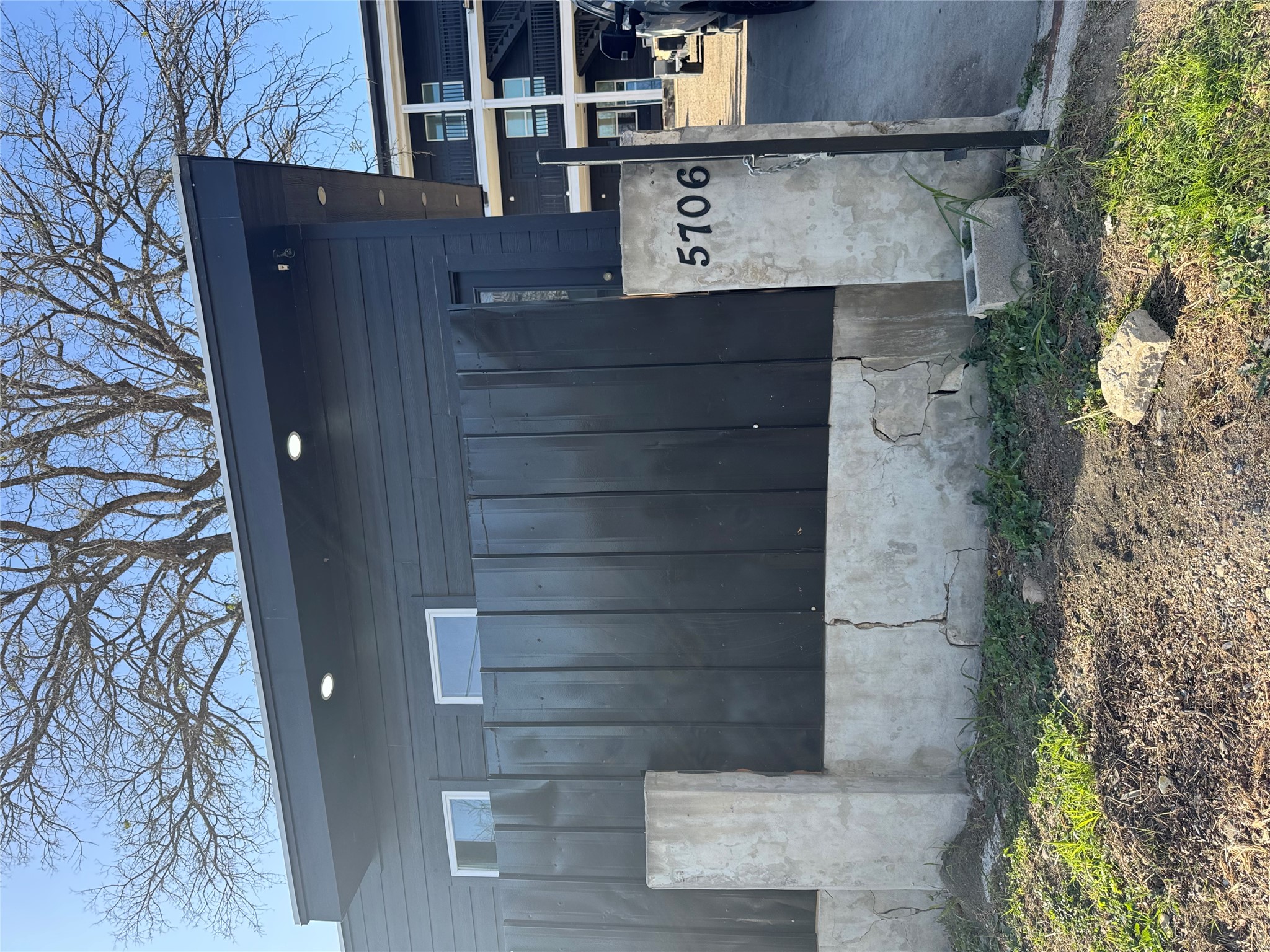5706 Melody Lane, Unit 2 Austin, TX 78724 - Photo 13 of 13 a front view of a house with a yard
