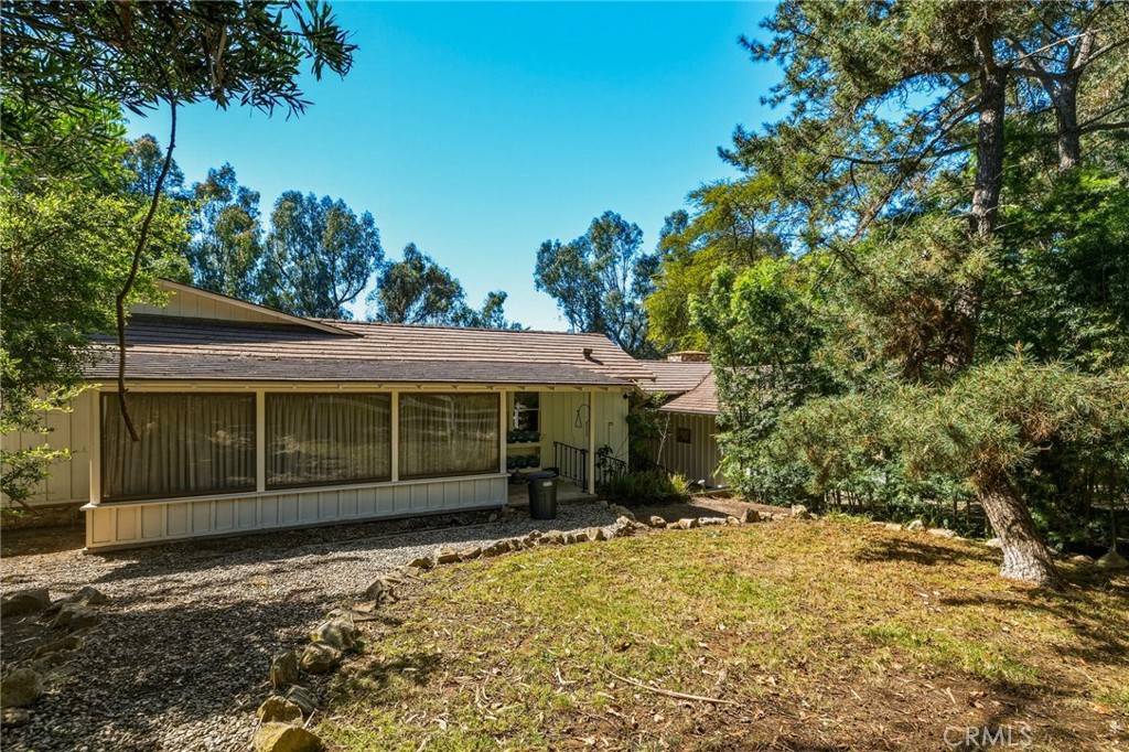 14 Johns Canyon Road Rolling Hills, CA 90274 - Photo 13 of 45 a view of a house with a yard