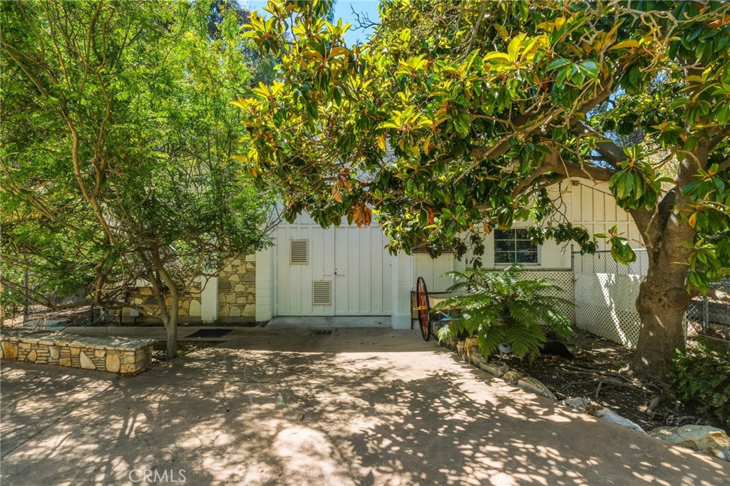 14 Johns Canyon Road Rolling Hills, CA 90274 - Photo 15 of 45 a view of a house with a tree