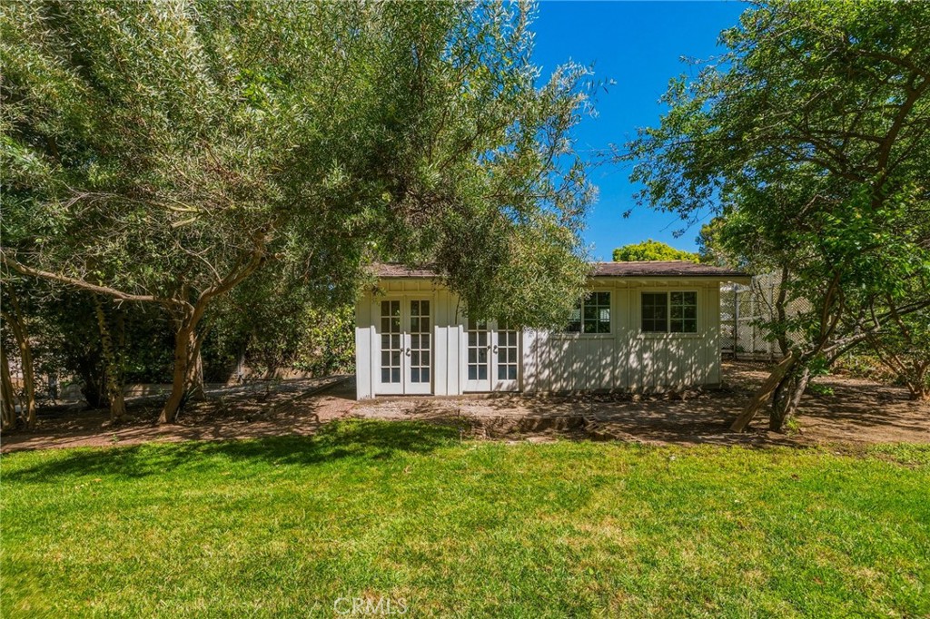 14 Johns Canyon Road Rolling Hills, CA 90274 - Photo 18 of 45 a front view of house with yard and green space