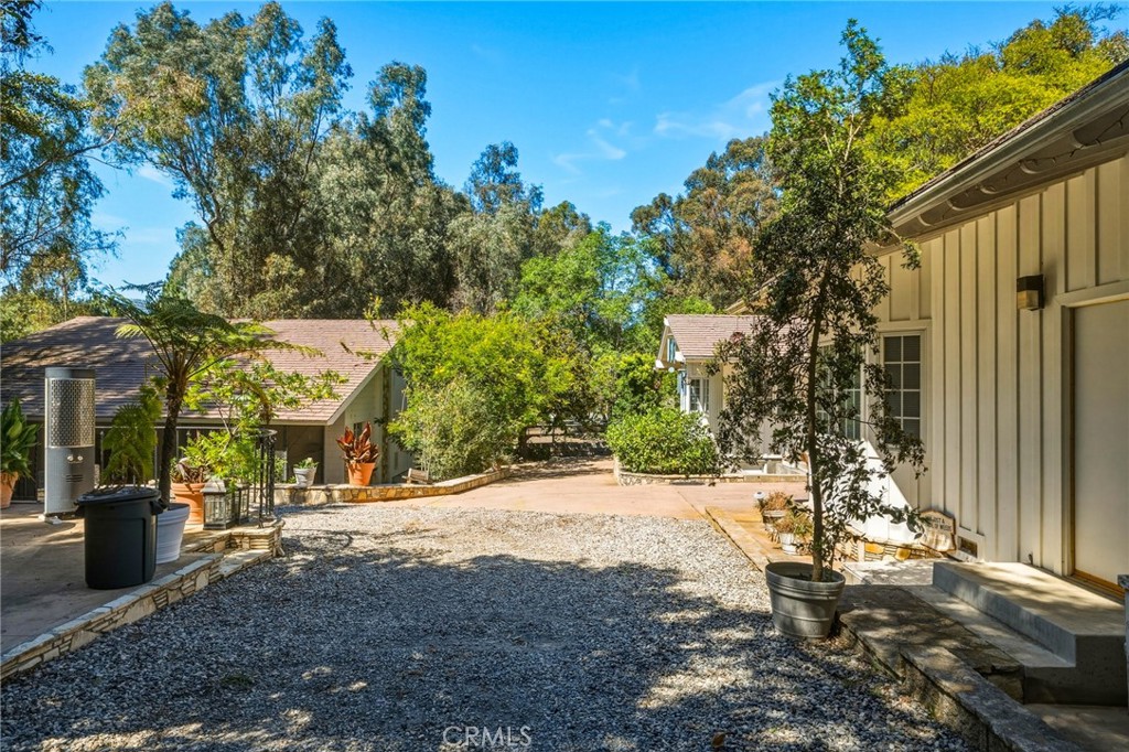 14 Johns Canyon Road Rolling Hills, CA 90274 - Photo 10 of 45 a backyard of a house with lots of green space