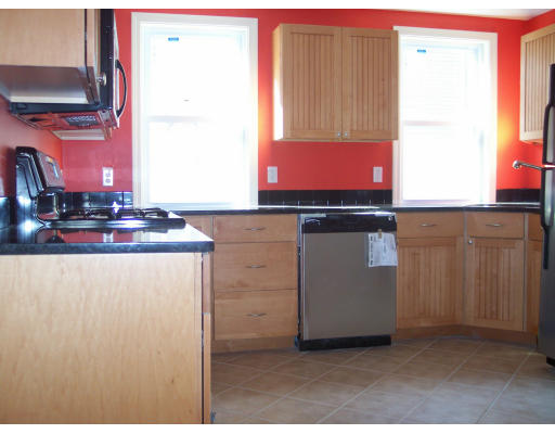 a room with cabinets and window