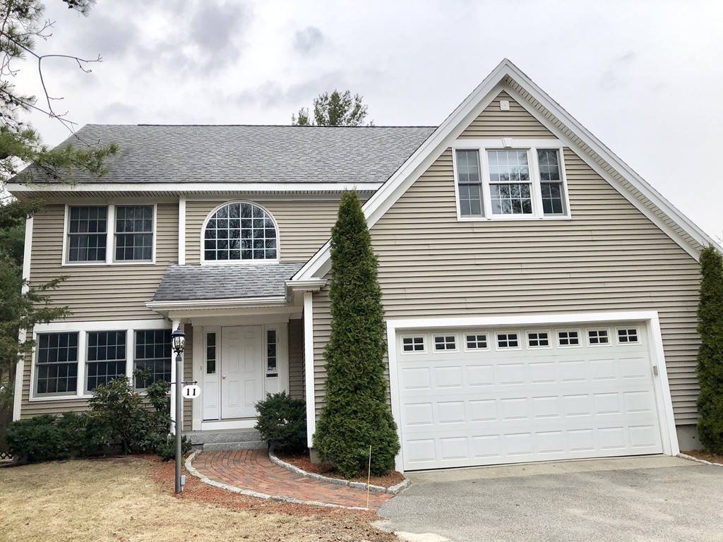 11 Hampton Road Sharon, MA 02067 - Photo 1 of 27 a front view of a house with a yard