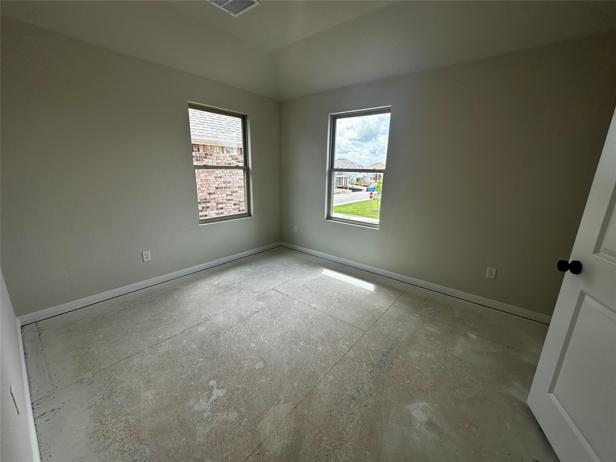 1053 Sienna Bear Road Georgetown, TX 78633 - Photo 22 of 32 a view of an empty room with a window