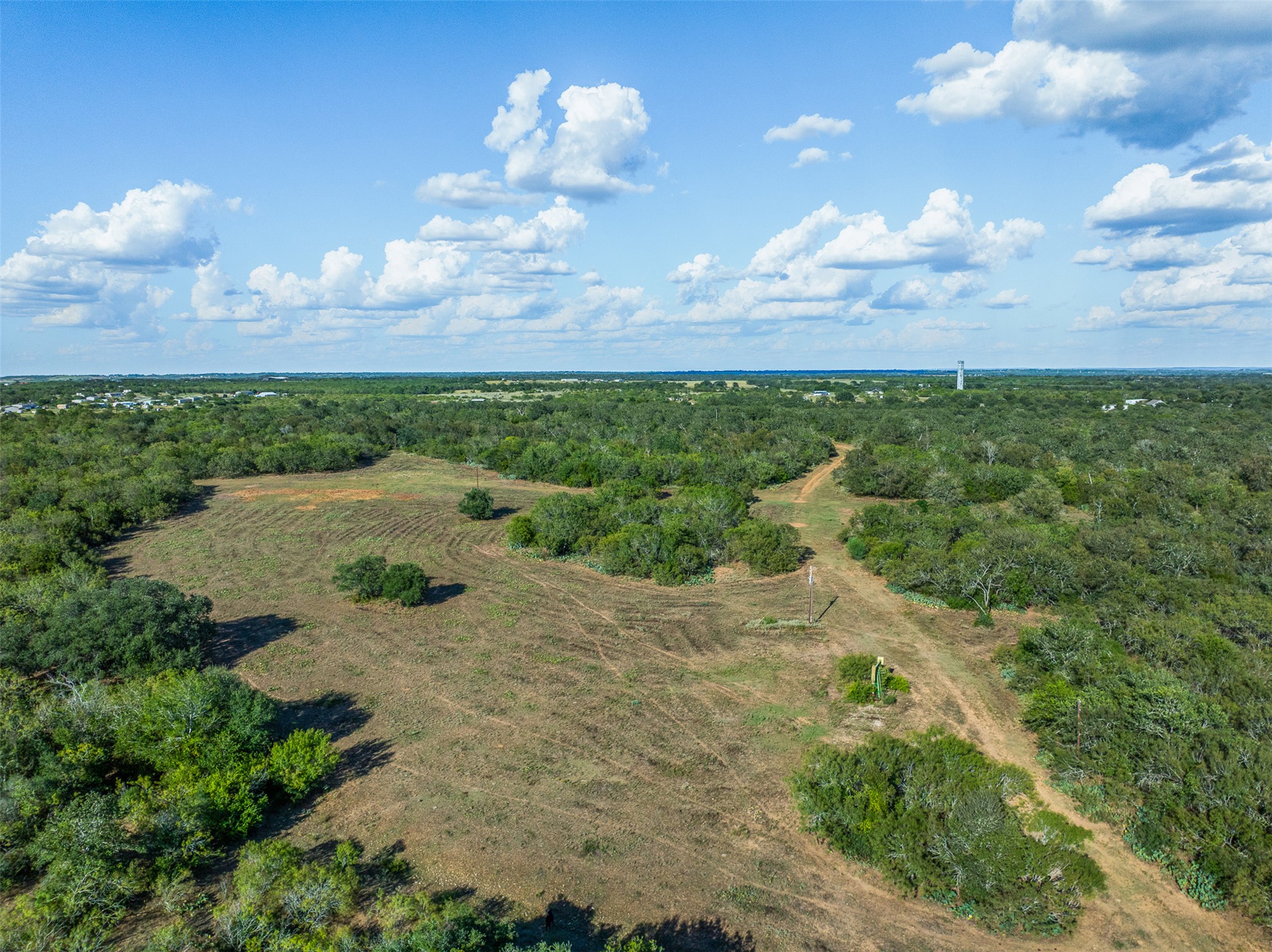 399 Seals Creek Road Lockhart, TX 78644 - Photo 17 of 40 Aerial view of sparsely populated area with a forest