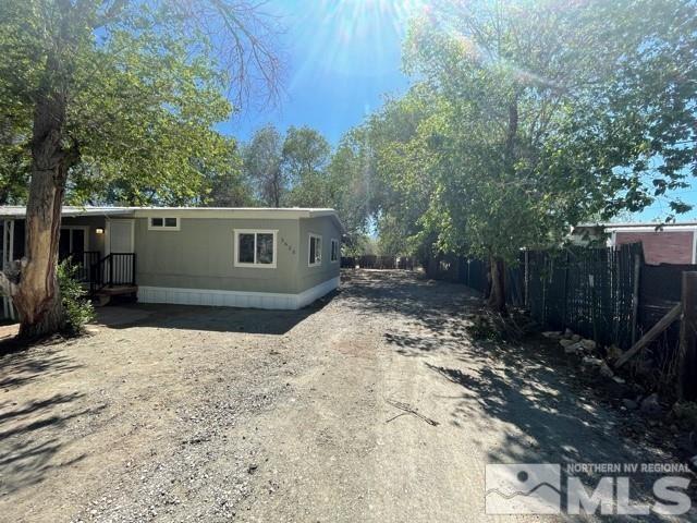 3625 Hummingbird Drive Reno, NV 89508 - Photo 13 of 18 a view of a house with a yard