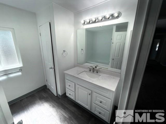 3625 Hummingbird Drive Reno, NV 89508 - Photo 8 of 18 a bathroom with a double vanity sink and mirror