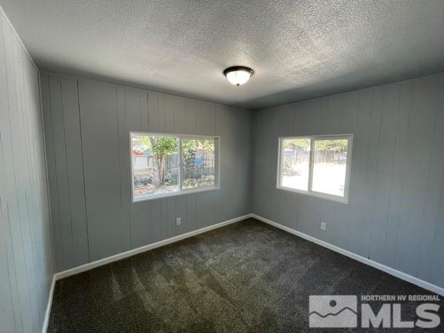 3625 Hummingbird Drive Reno, NV 89508 - Photo 10 of 18 an empty room with windows