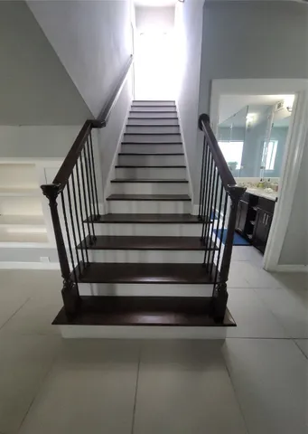 a view of a balcony with furniture