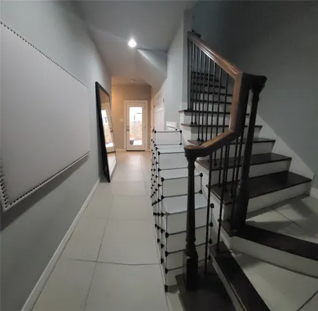 a view of entryway with wooden floor