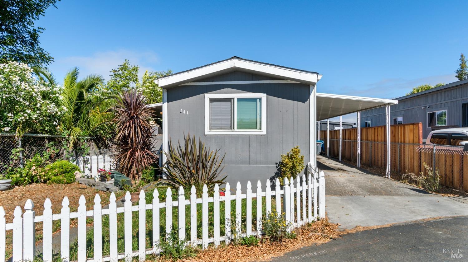 a front view of house with pathway