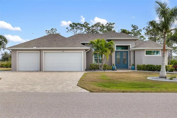 front view of a house and a yard