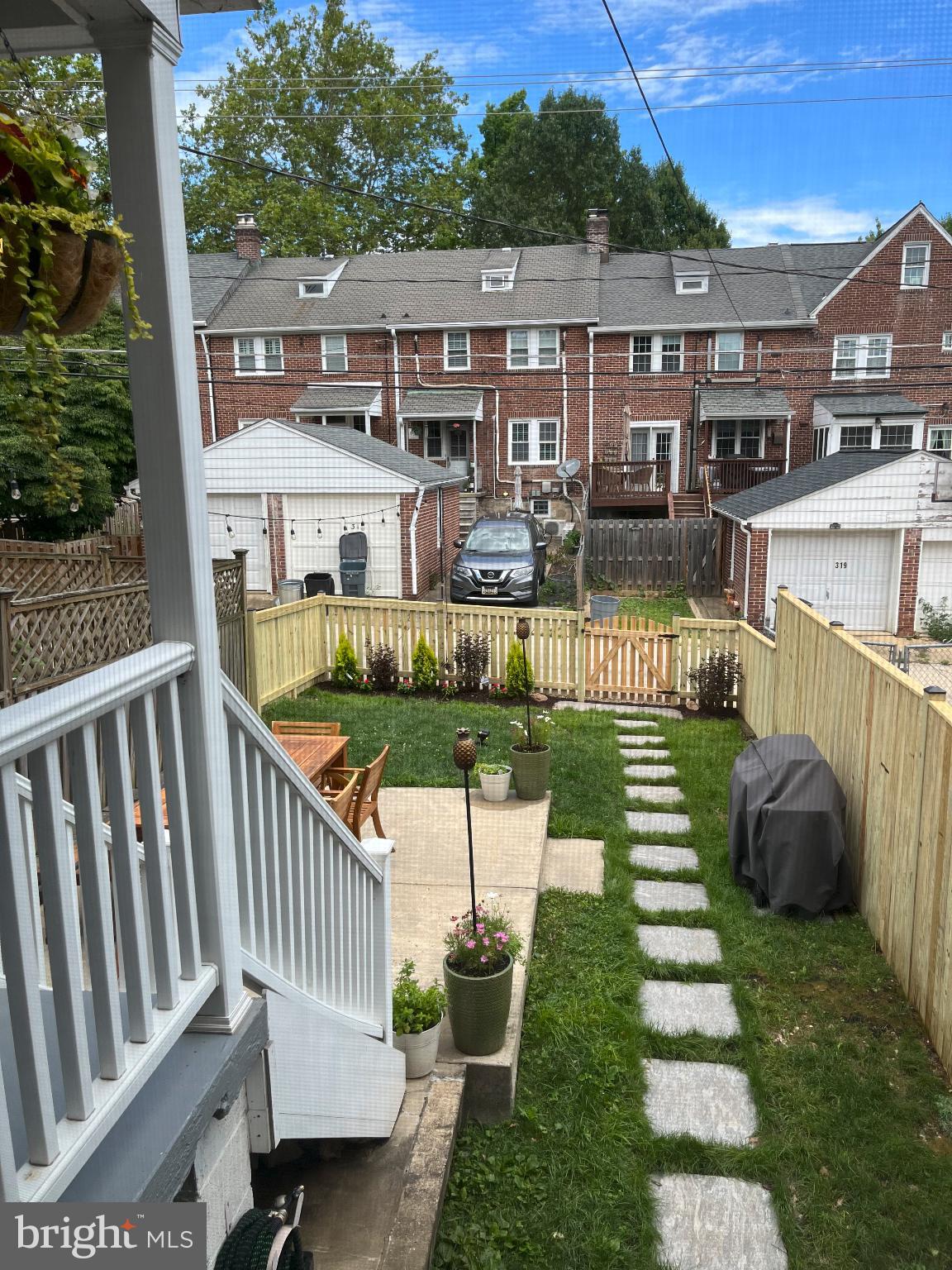 318 Hopkins Road Baltimore, MD 21212 - Photo 33 of 37 Charming backyard oasis with stone pathway.