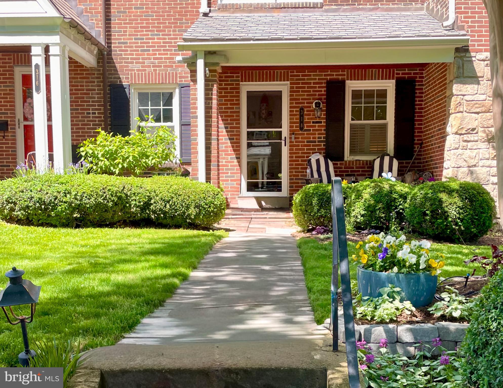 318 Hopkins Road Baltimore, MD 21212 - Photo 34 of 37 Charming entrance with lush greenery.