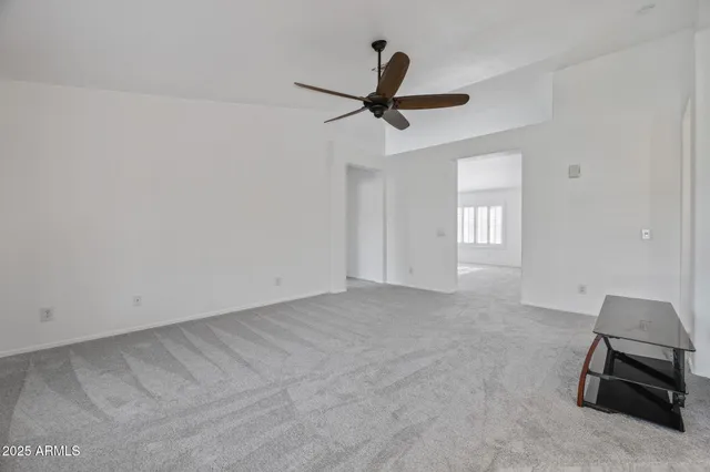a view of workspace with furniture and window